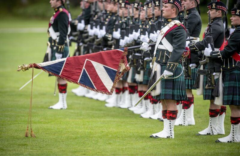ALFIE BLACKHALL (SH 14-16) BEARS THE KING’S COLOURS